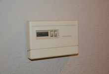 987 Main Street , Roseville, CA, 95874 Listing: Hallway Thermostat Photo by Real Estate Agent